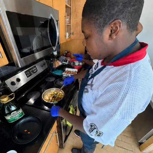Cooking veggies at the stove