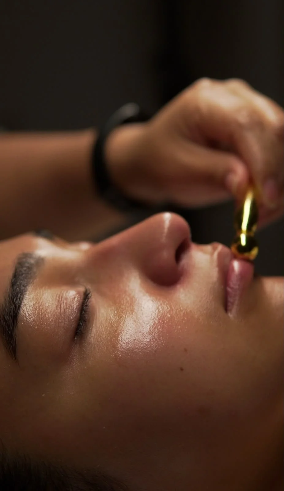 Dermaplaning along the upper lip in the Tourmaline treatment room