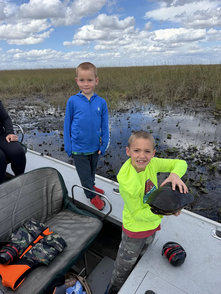 Children taking part in a Florida reptile encounter