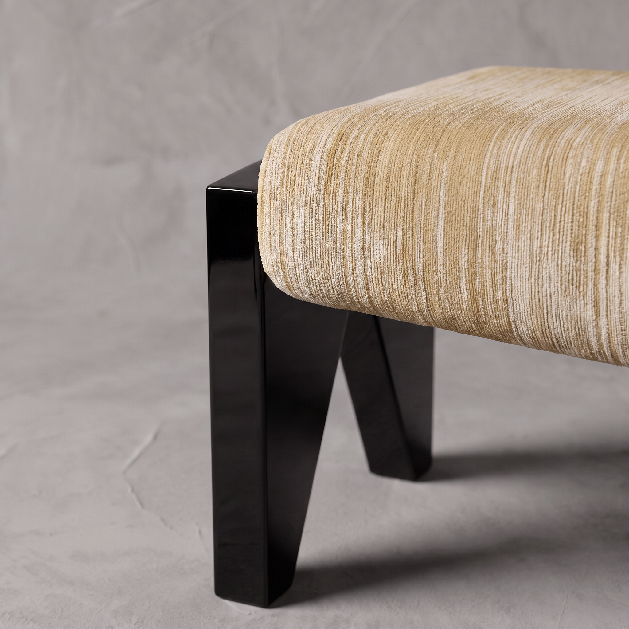 Slash Works Object 04 — close-up of the cushion edge and leg from the side