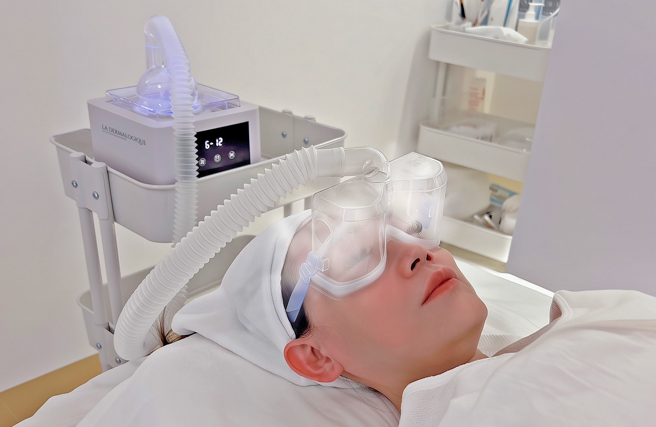 A close crop of the eye area during a gentle treatment step; avoid medical-looking claims.