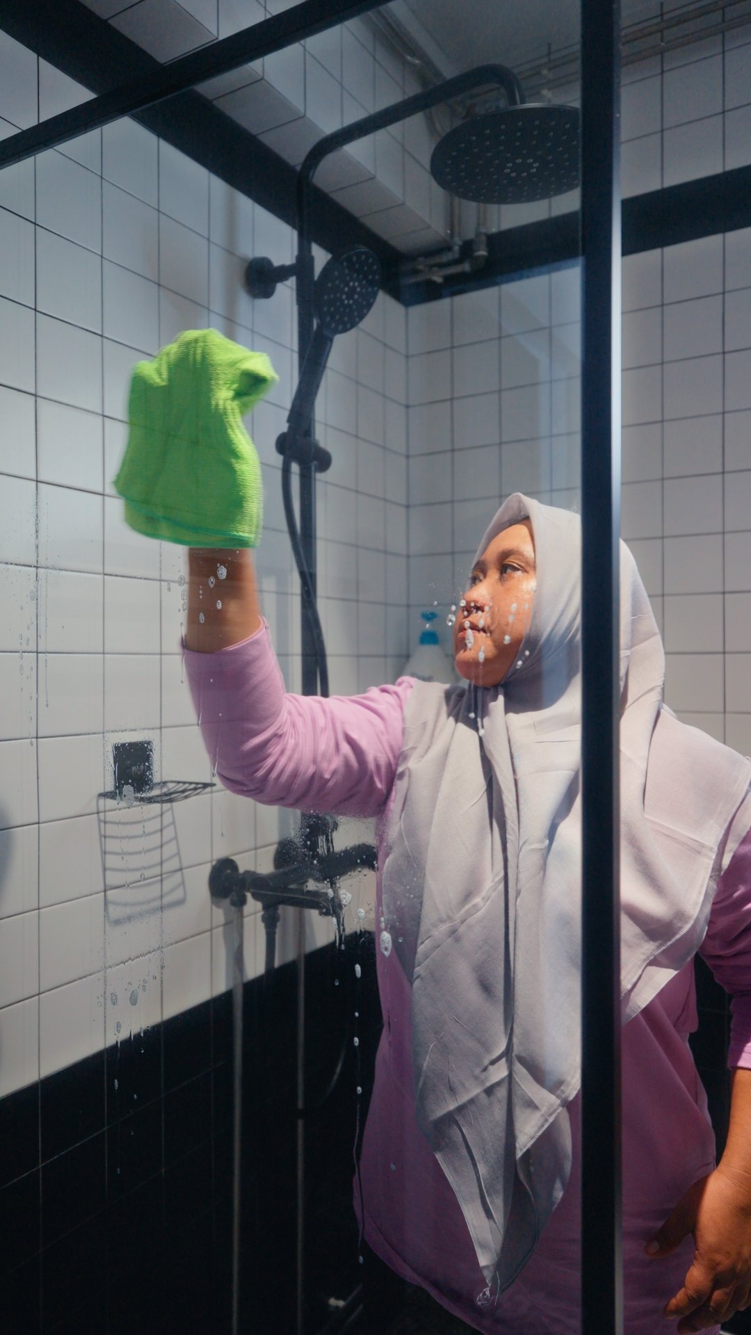 Helper cleaning home