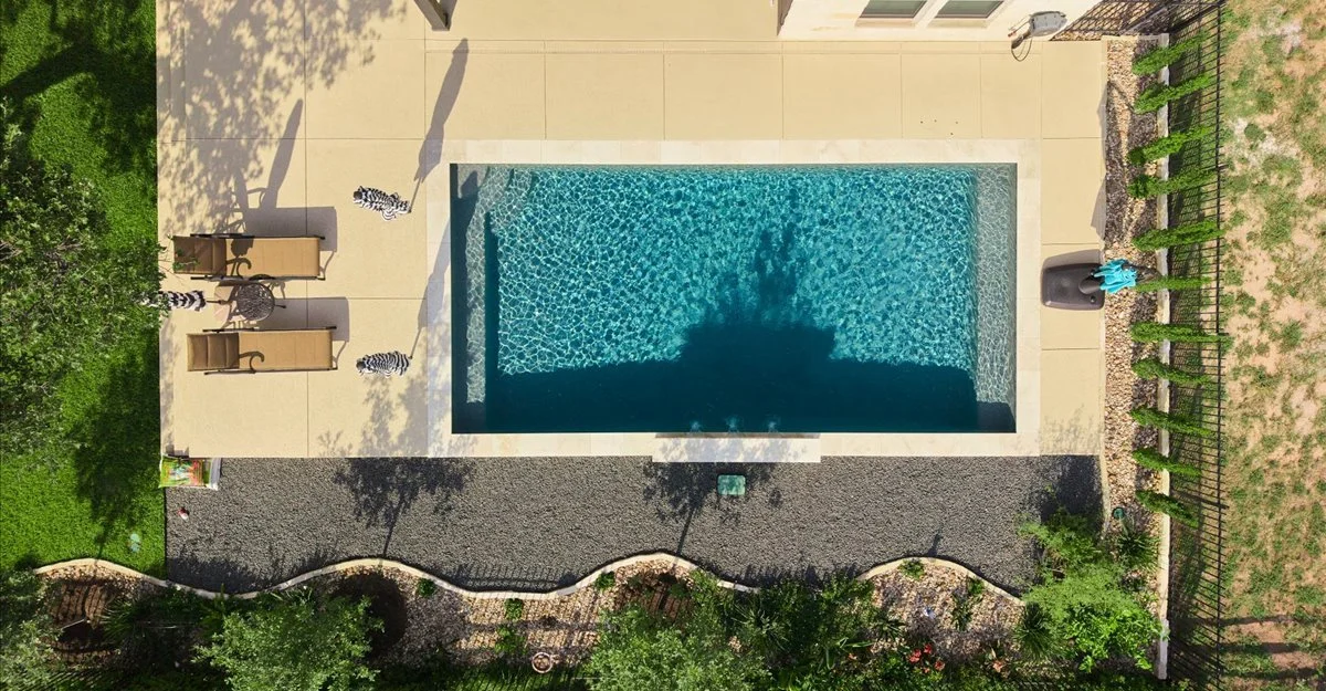 Overhead aerial view of pool, spa, and patio — Horseshoe Bay Texas