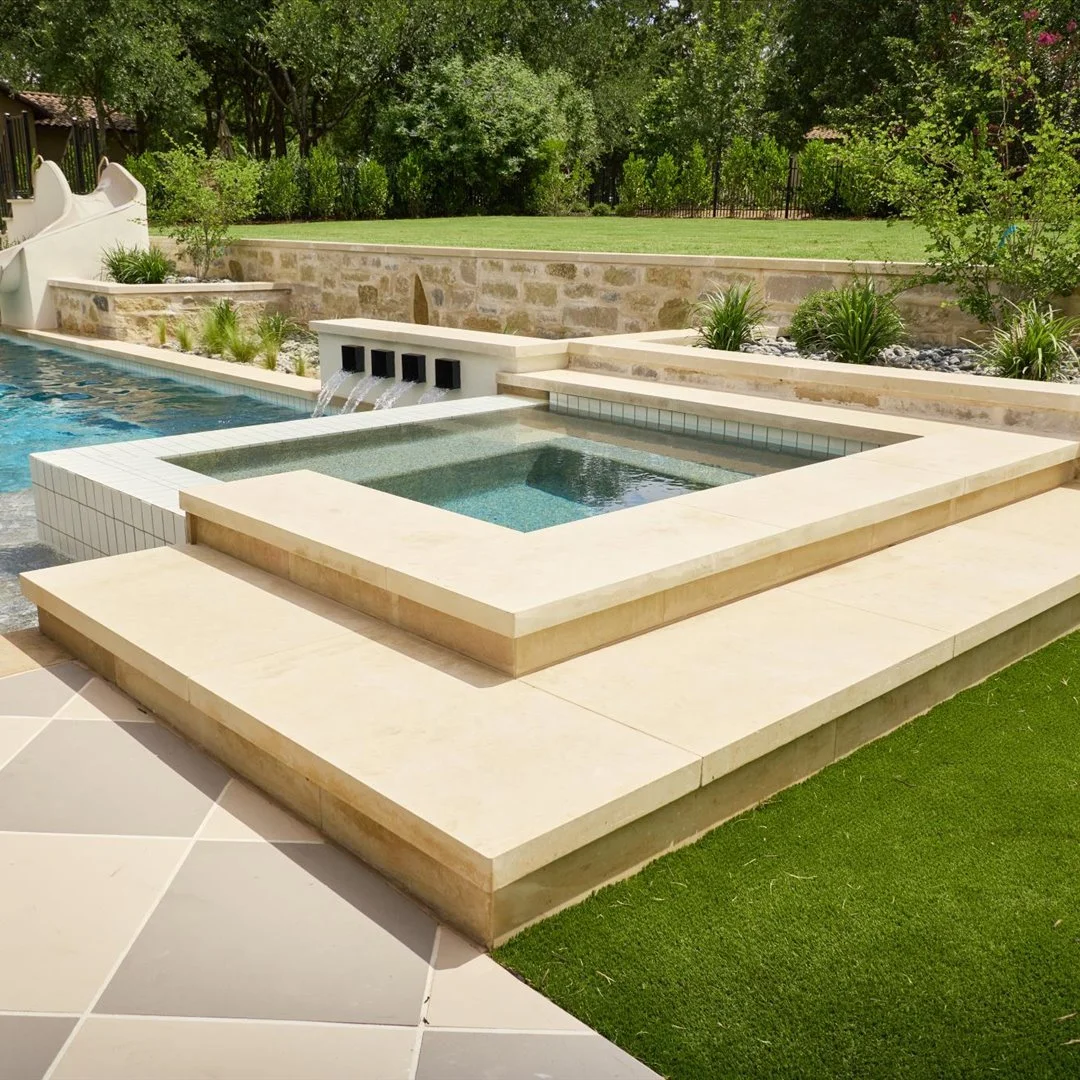 Raised spa with hand-selected stone coping — Larkin residence Georgetown