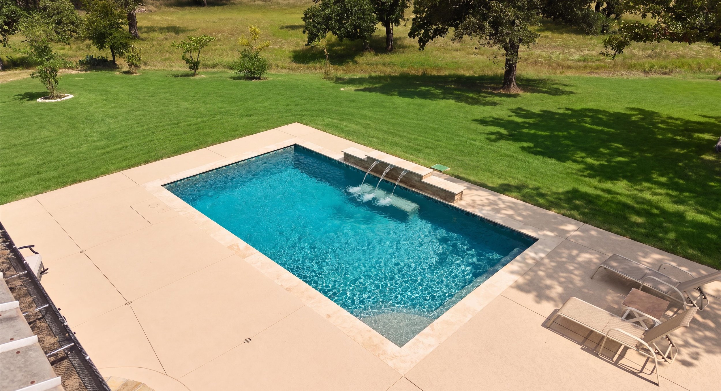 Aerial overview of custom gunite pool — Kingsland, Texas