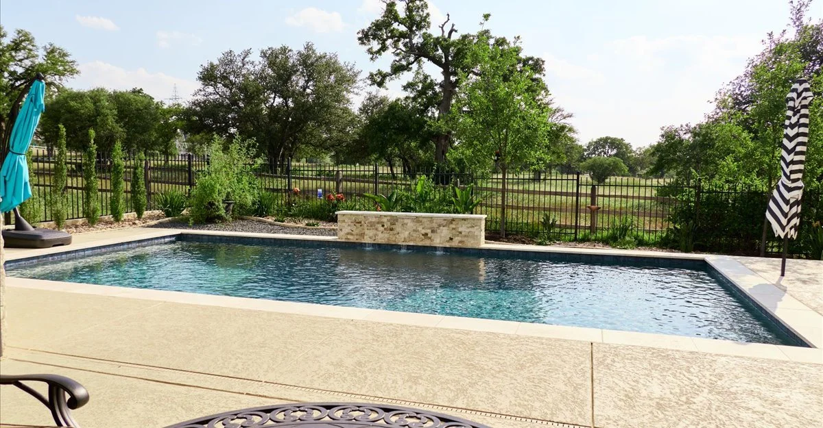 Tanning ledge with Hill Country views — Horseshoe Bay custom pool