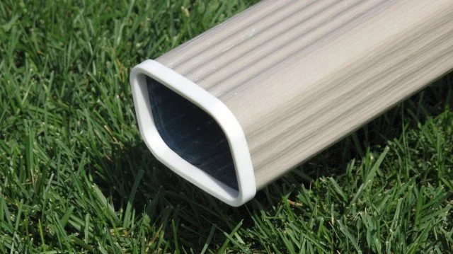 Installed downspout with SpoutTrim showing a clean finished edge