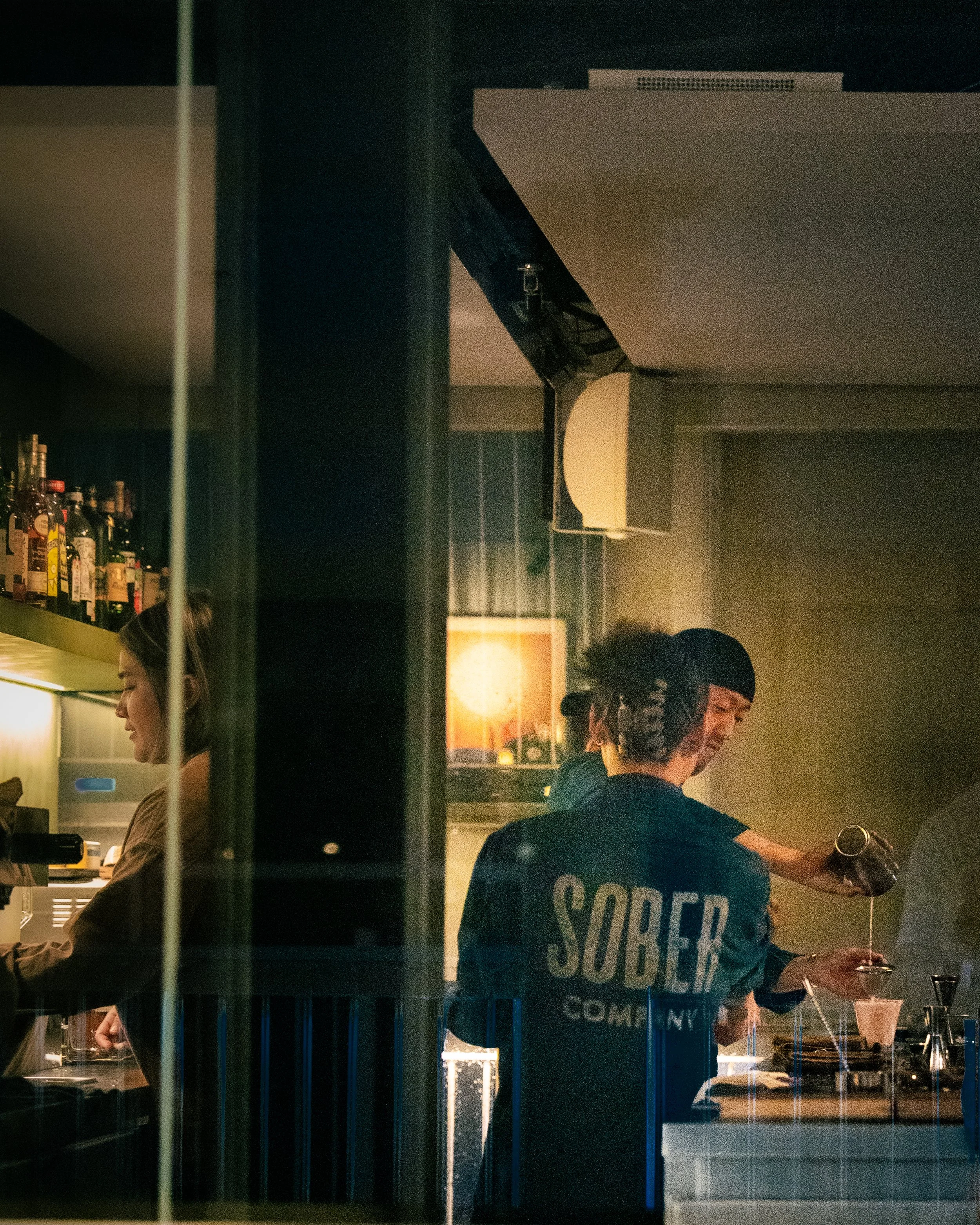 Person smiling at a restaurant