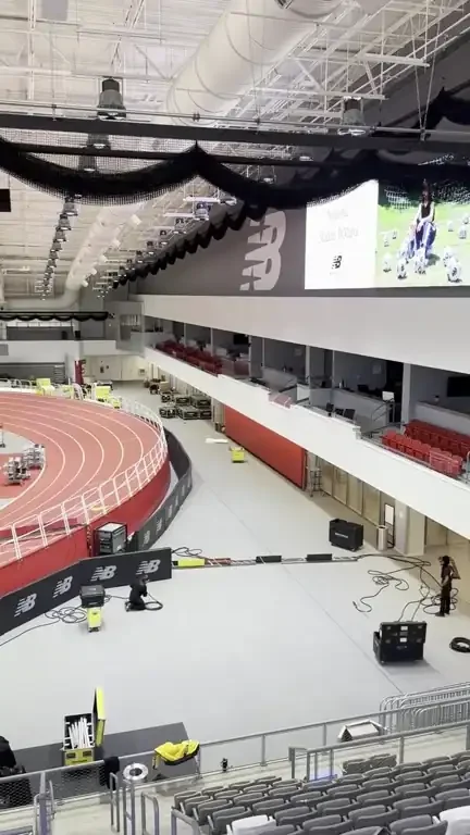Walking through the stands of an indoor track arena on our Boston trip