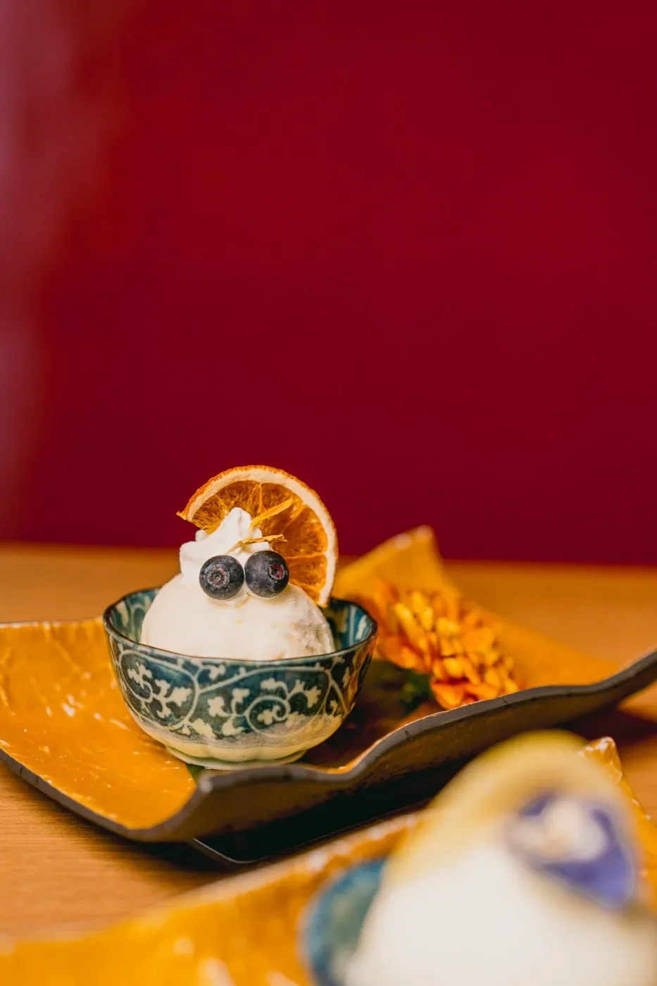 House dessert with dried orange