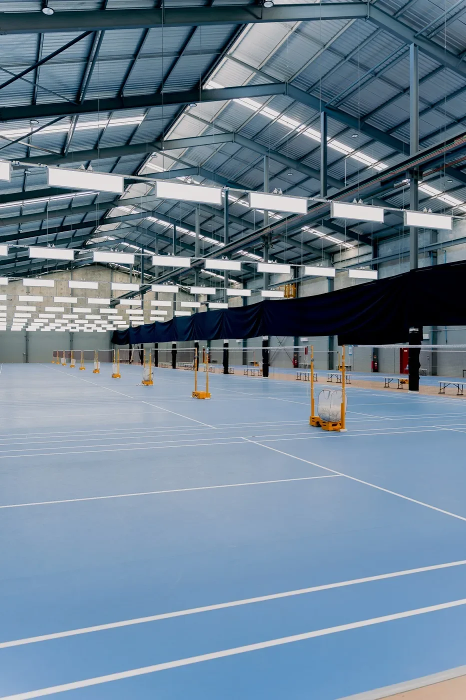 The courts at Perth Badminton Arena