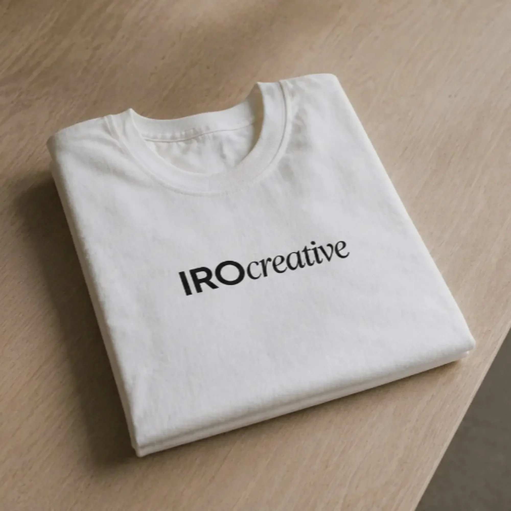 Folded IRO Creative branded t-shirt