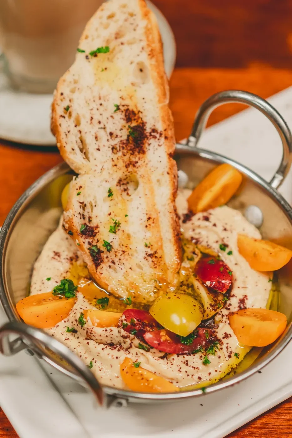 Hummus and toasted bread share plate