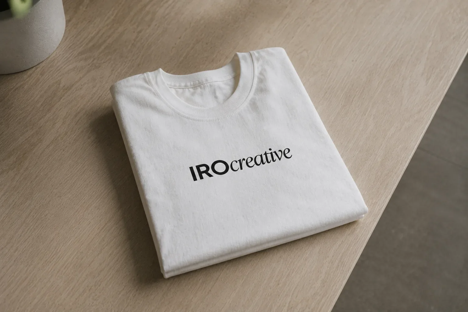 Folded IRO Creative branded t-shirt