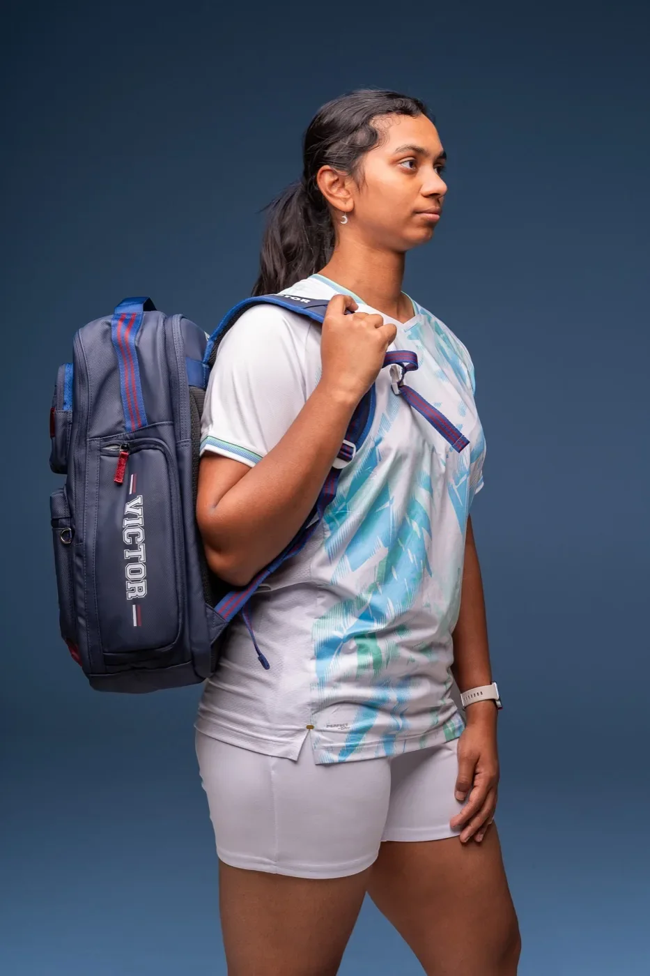A sponsored athlete with a Victor kit bag