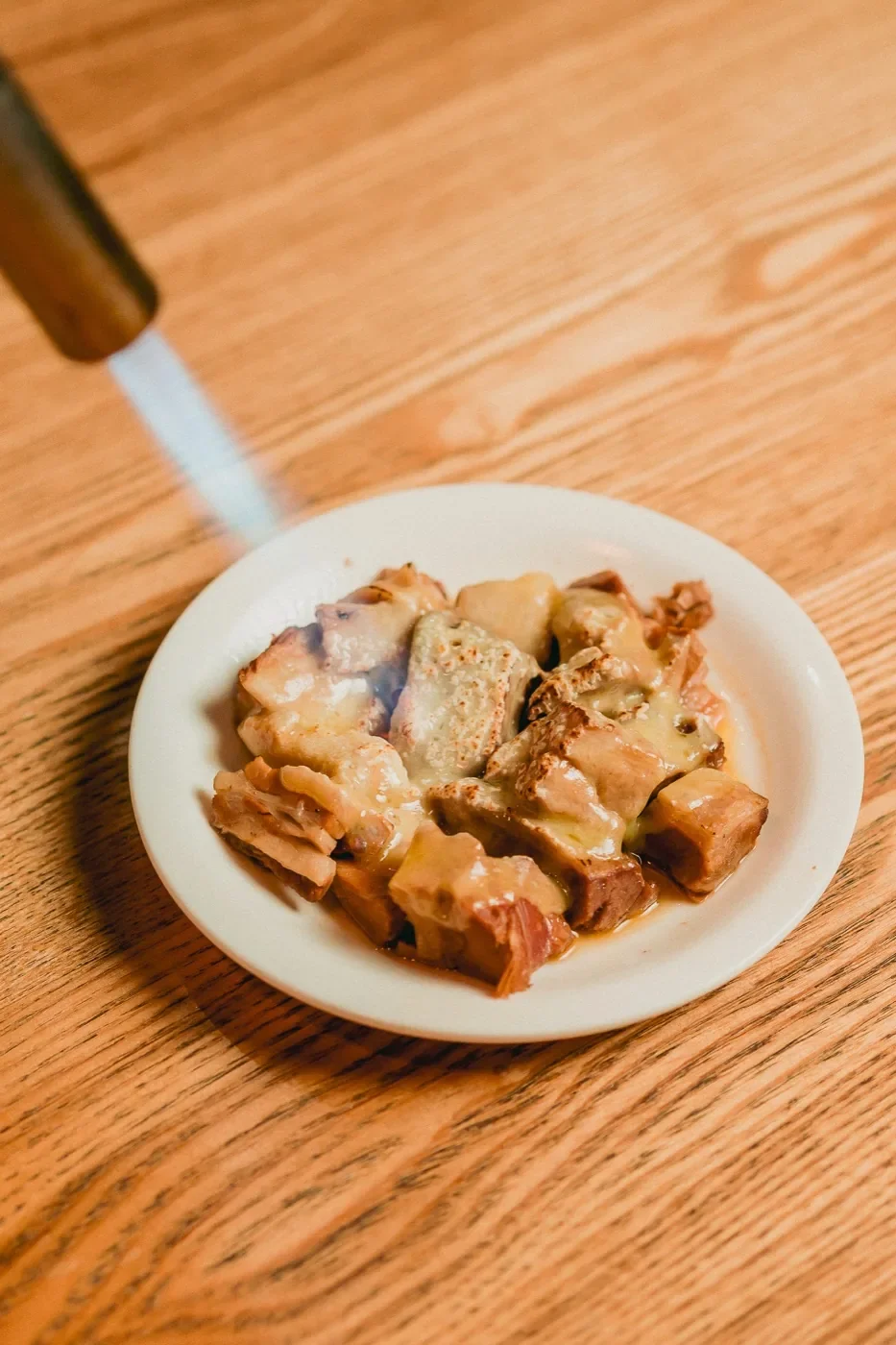 A dish finished with a blowtorch sear