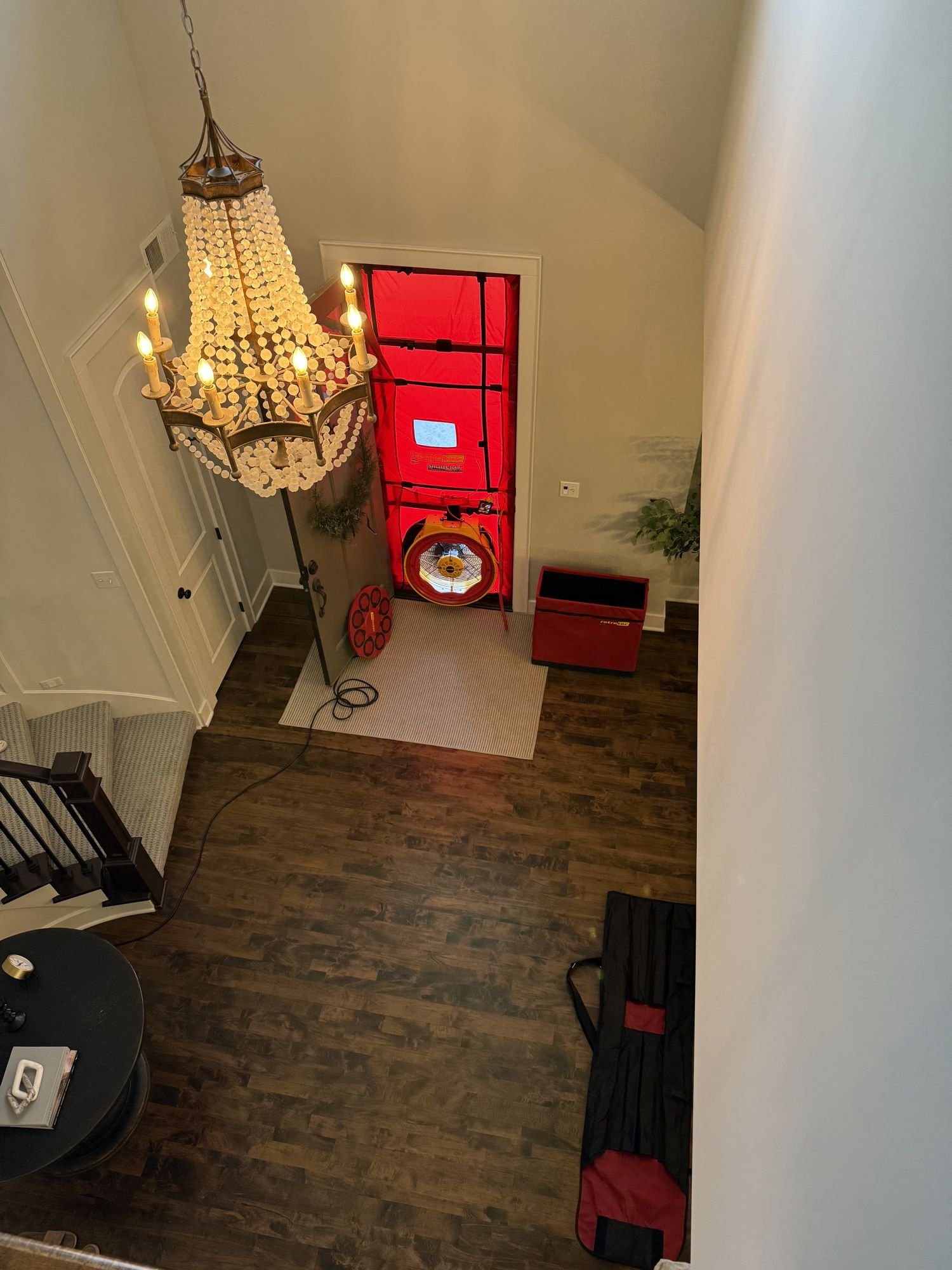 Whole-house blower door test with RetroTec equipment