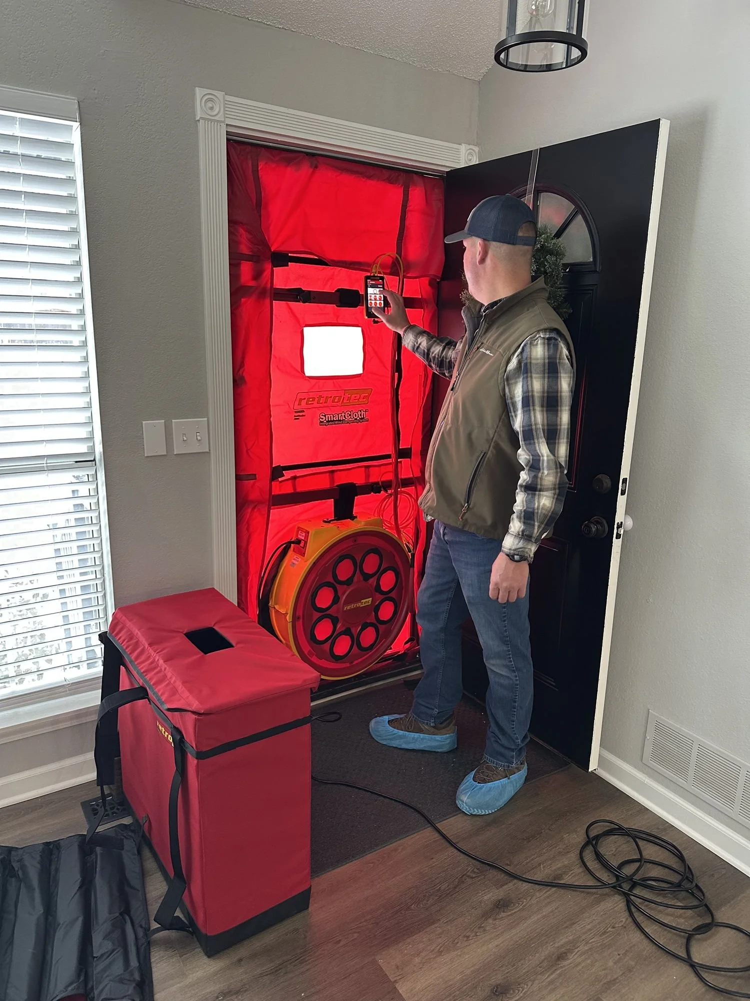 Air leakage testing on a high-performance home