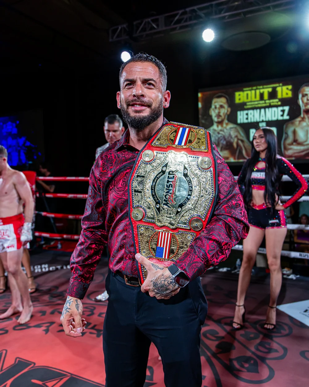 Monster Promotions champion with the title belt