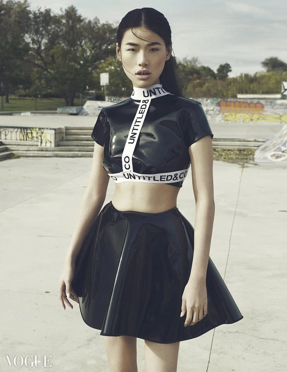 Editorial fashion photograph by Roberto Vazquez featuring an Asian model, published in Vogue