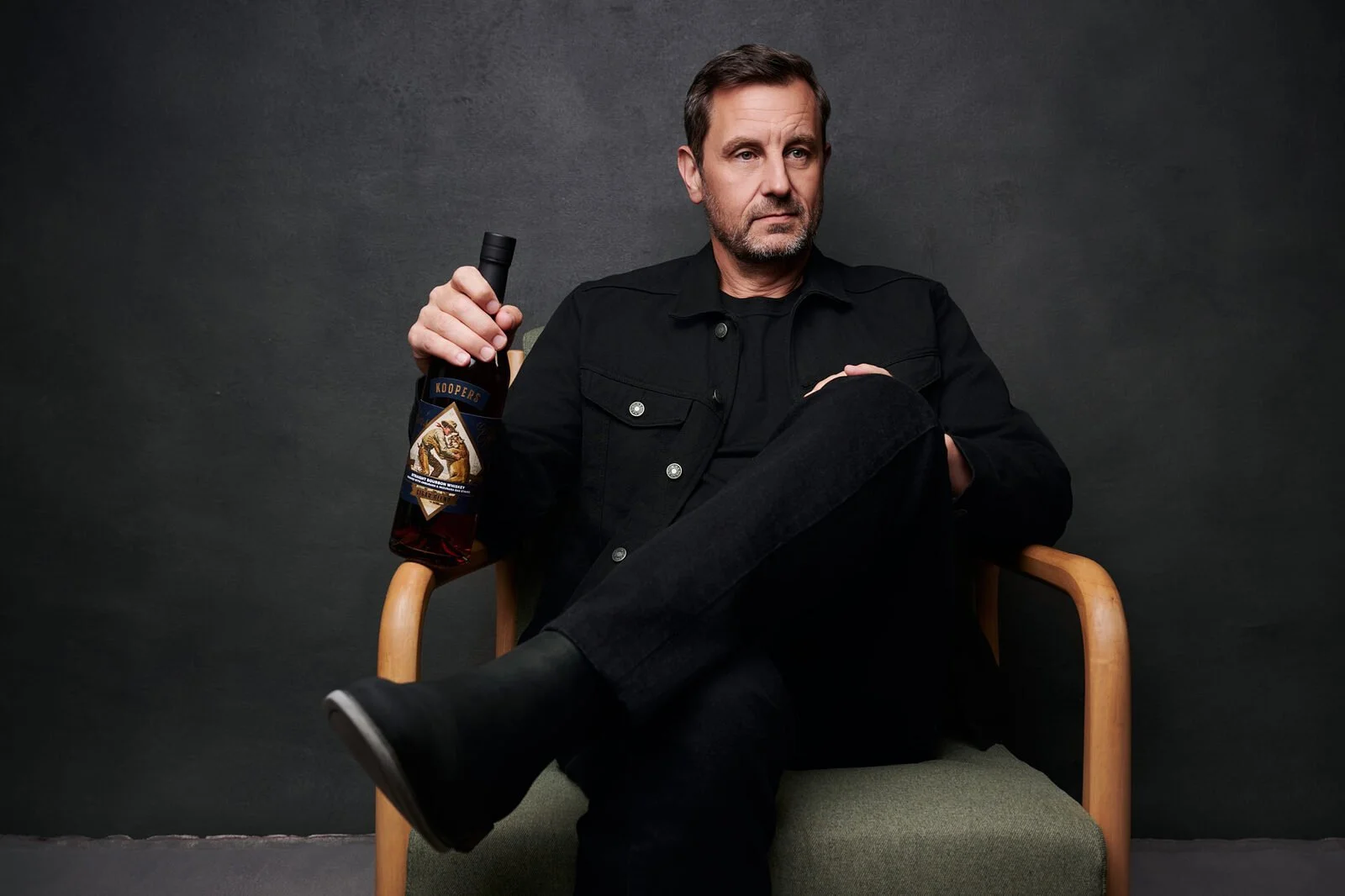 A company founder photographed seated by Ryan Dunbar