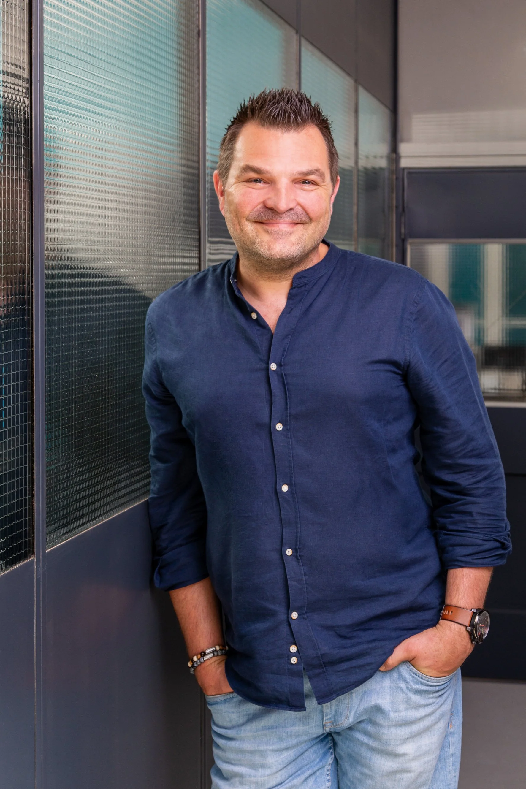 On-location Portrait of Company owner casual