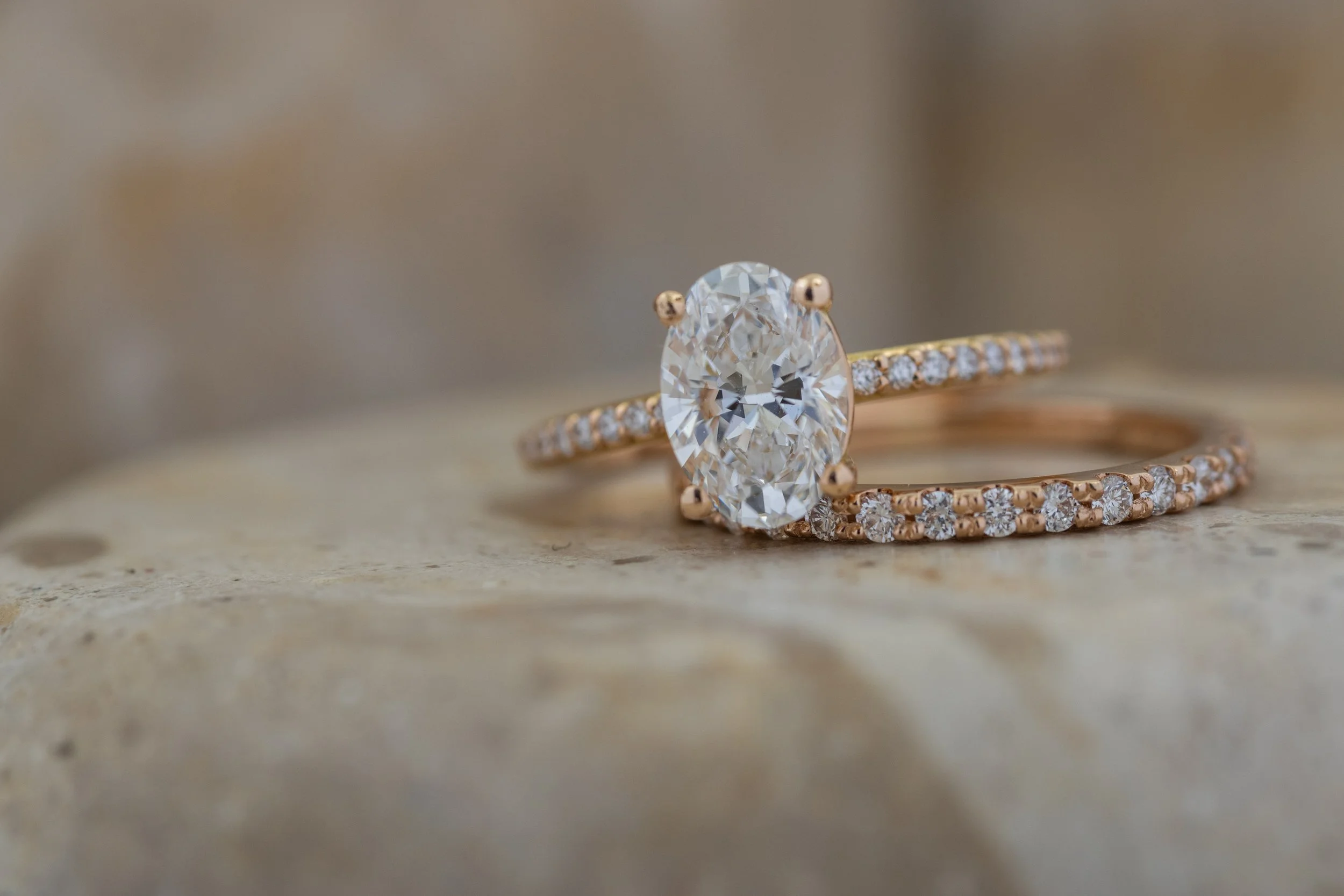 Jewellery photography of a diamond ring on fabric
