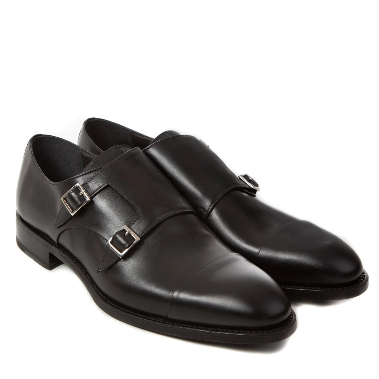 E-commerce product photography of black leather monk-strap shoes