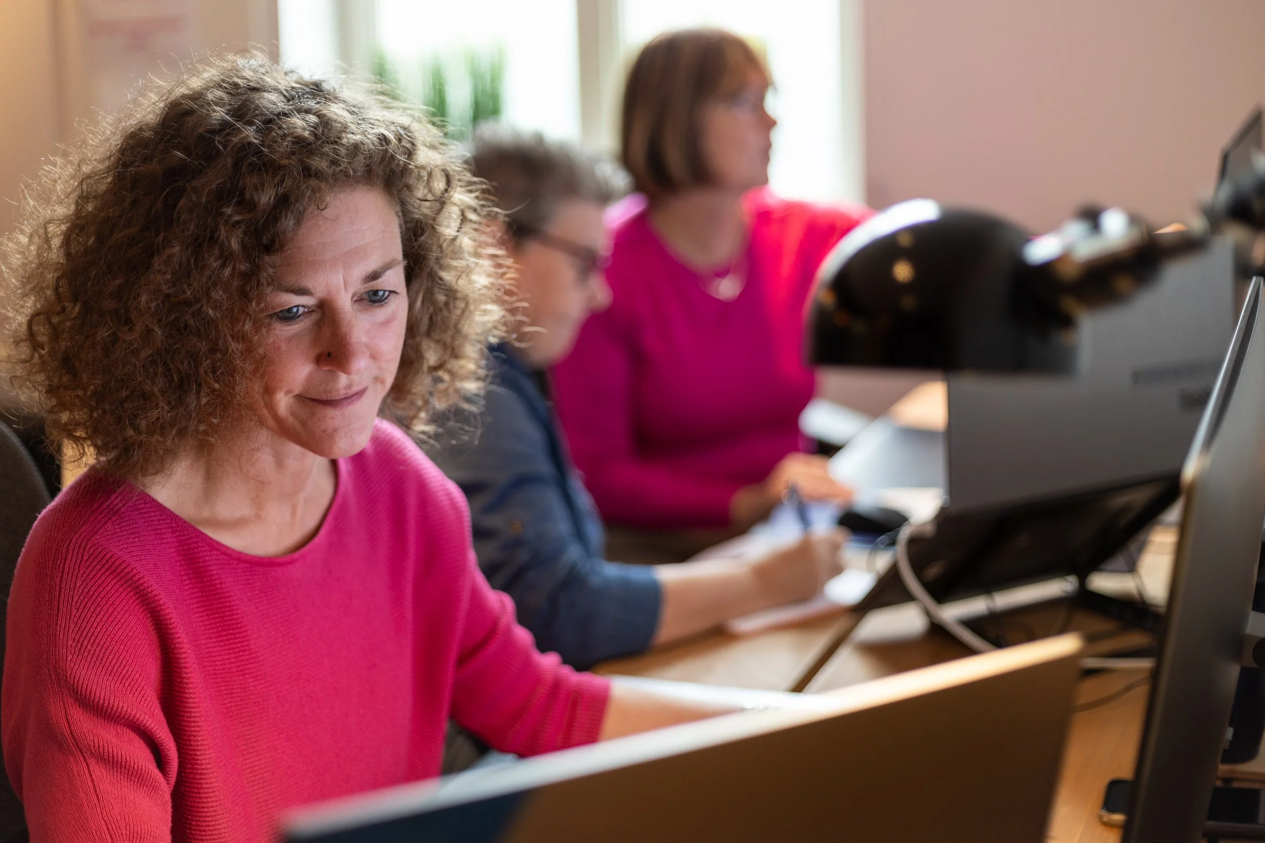 Picture of woman at her workstation