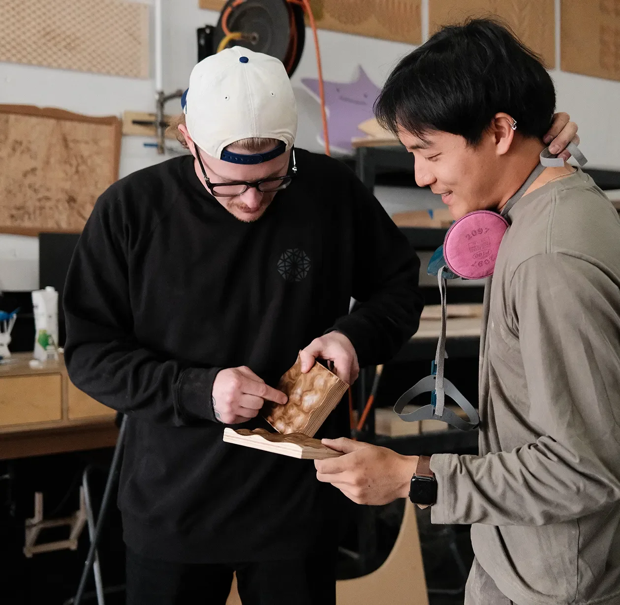 Project manager and fabricator reviewing a component together on the shop floor
