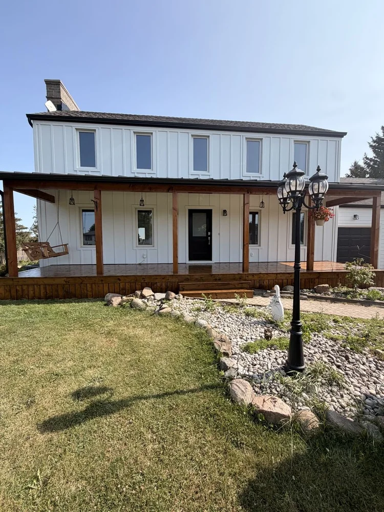 Farmhouse front porch stained in Pecan in Mossley, Ontario