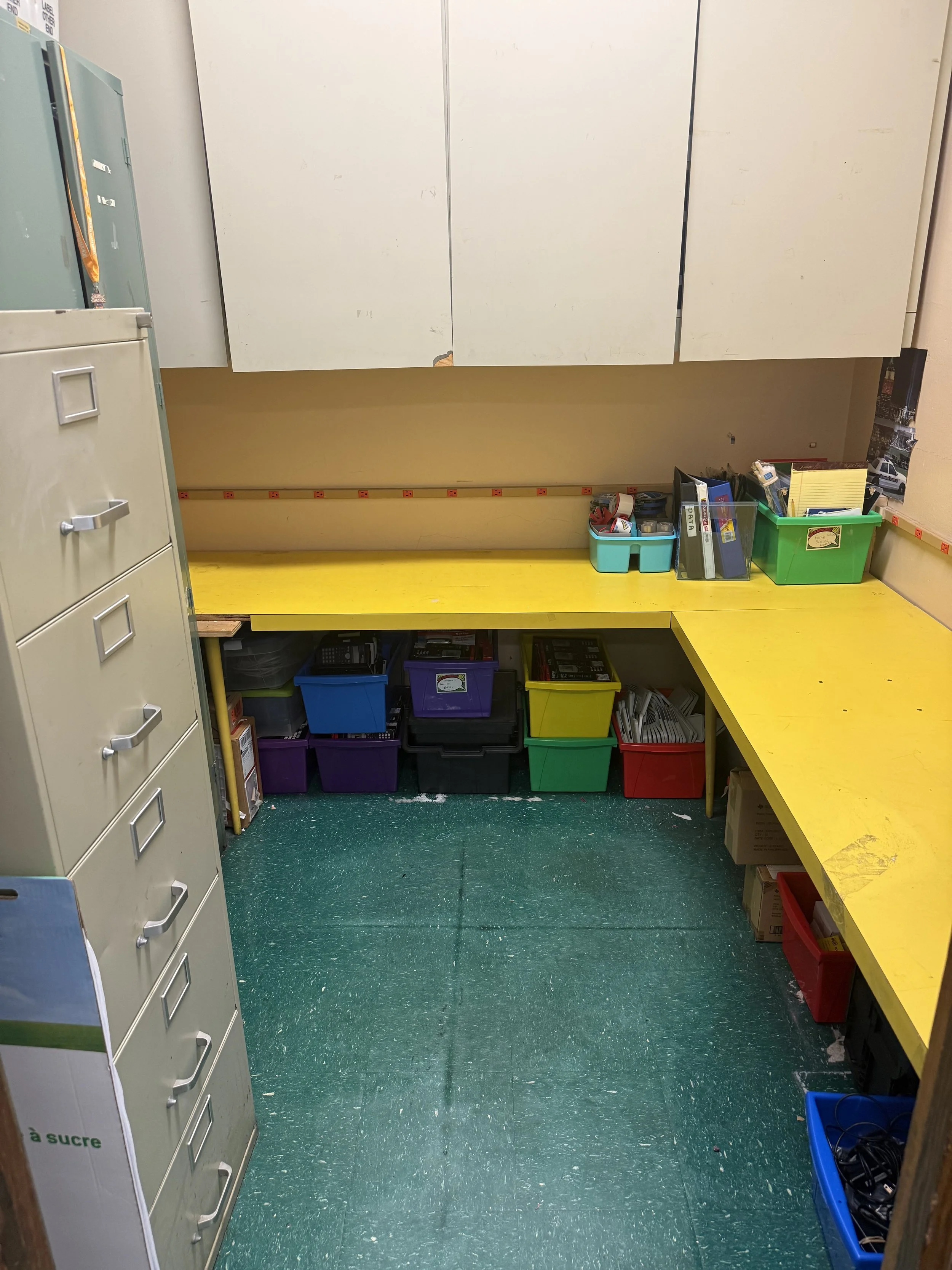Worker organizing school supplies