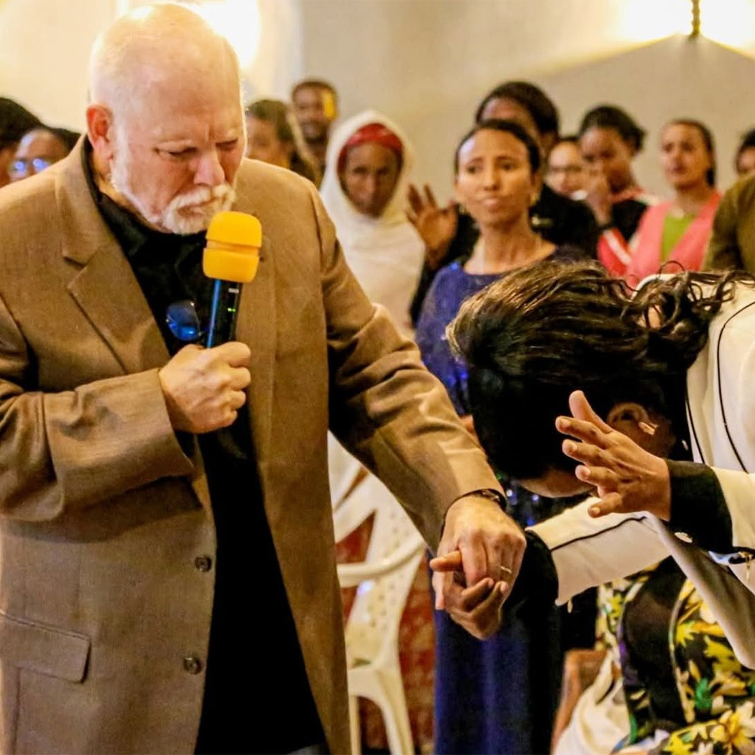 A trainer teaching a group of missionaries