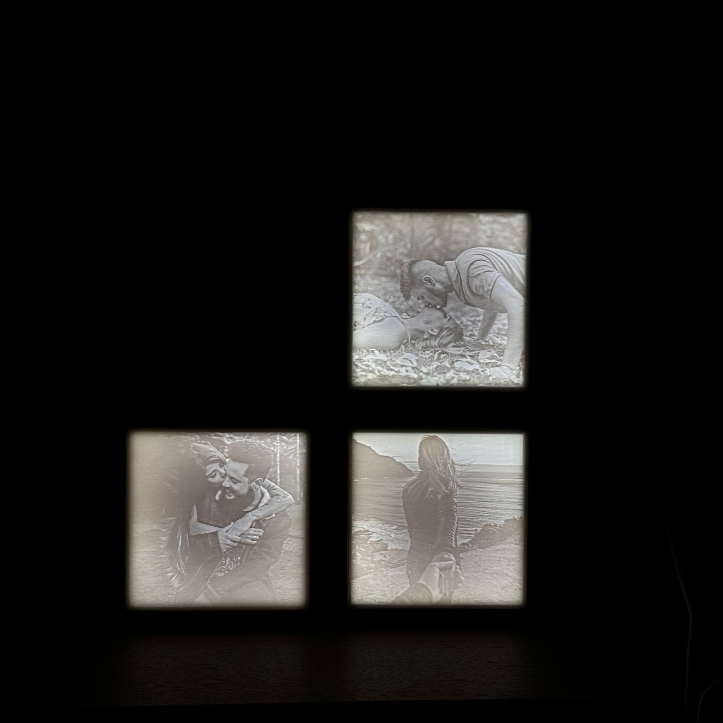 Drie verlichte fotoframes met koppelfoto's
