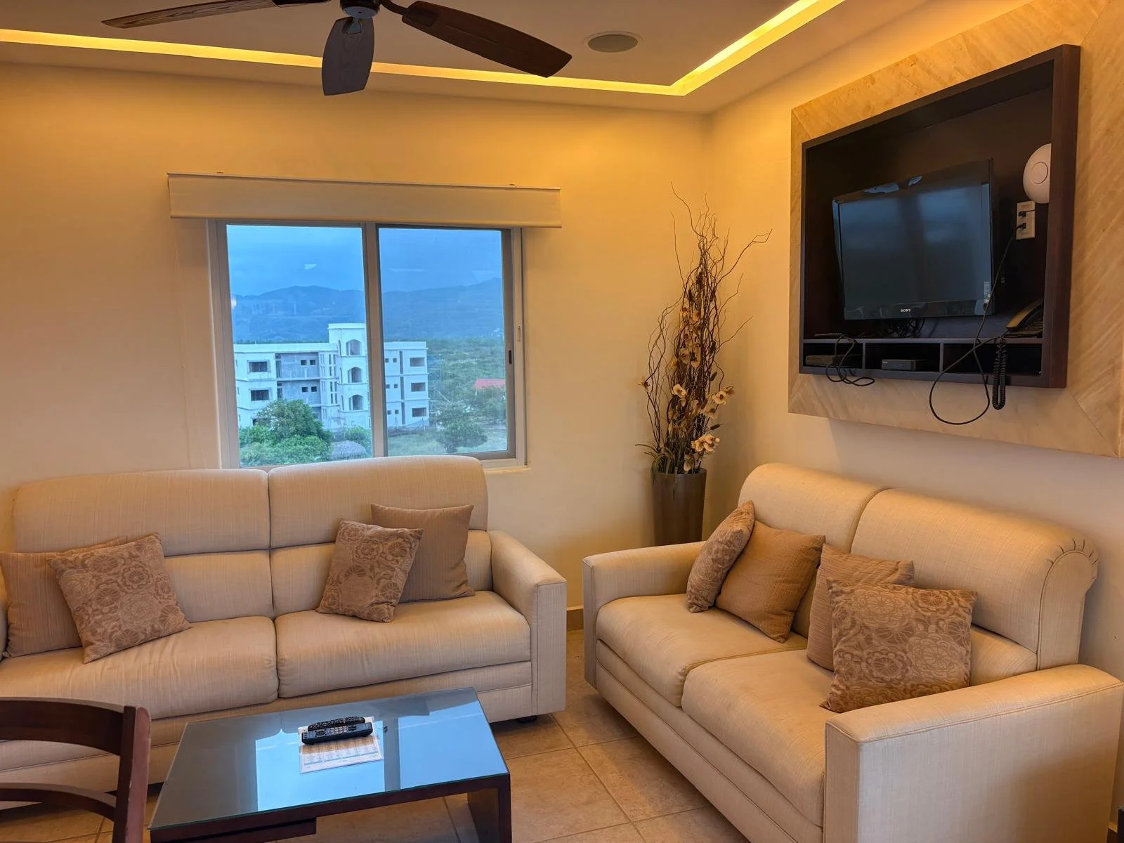Unit 242, Vivo Resorts Building B: Living room with sofas and TV
