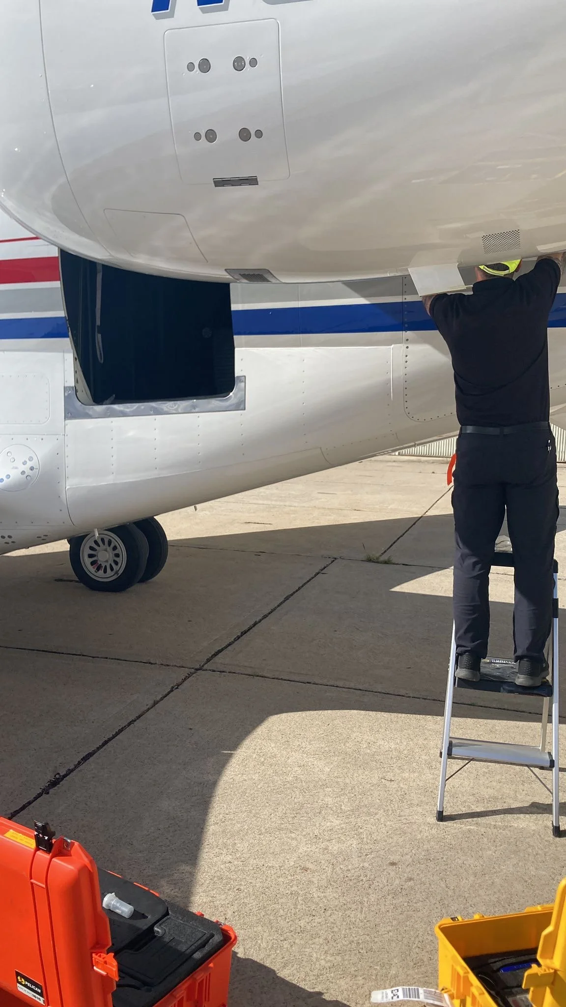 Don Jones inspecting aircraft nose section
