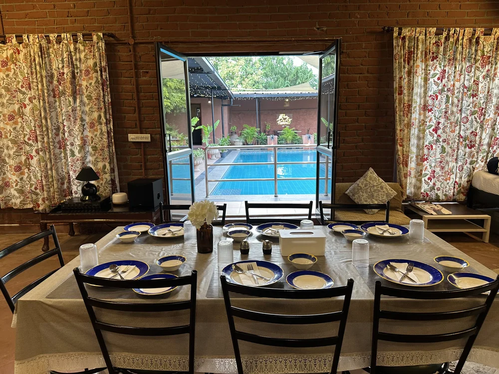 Tavern dining room with a pool view