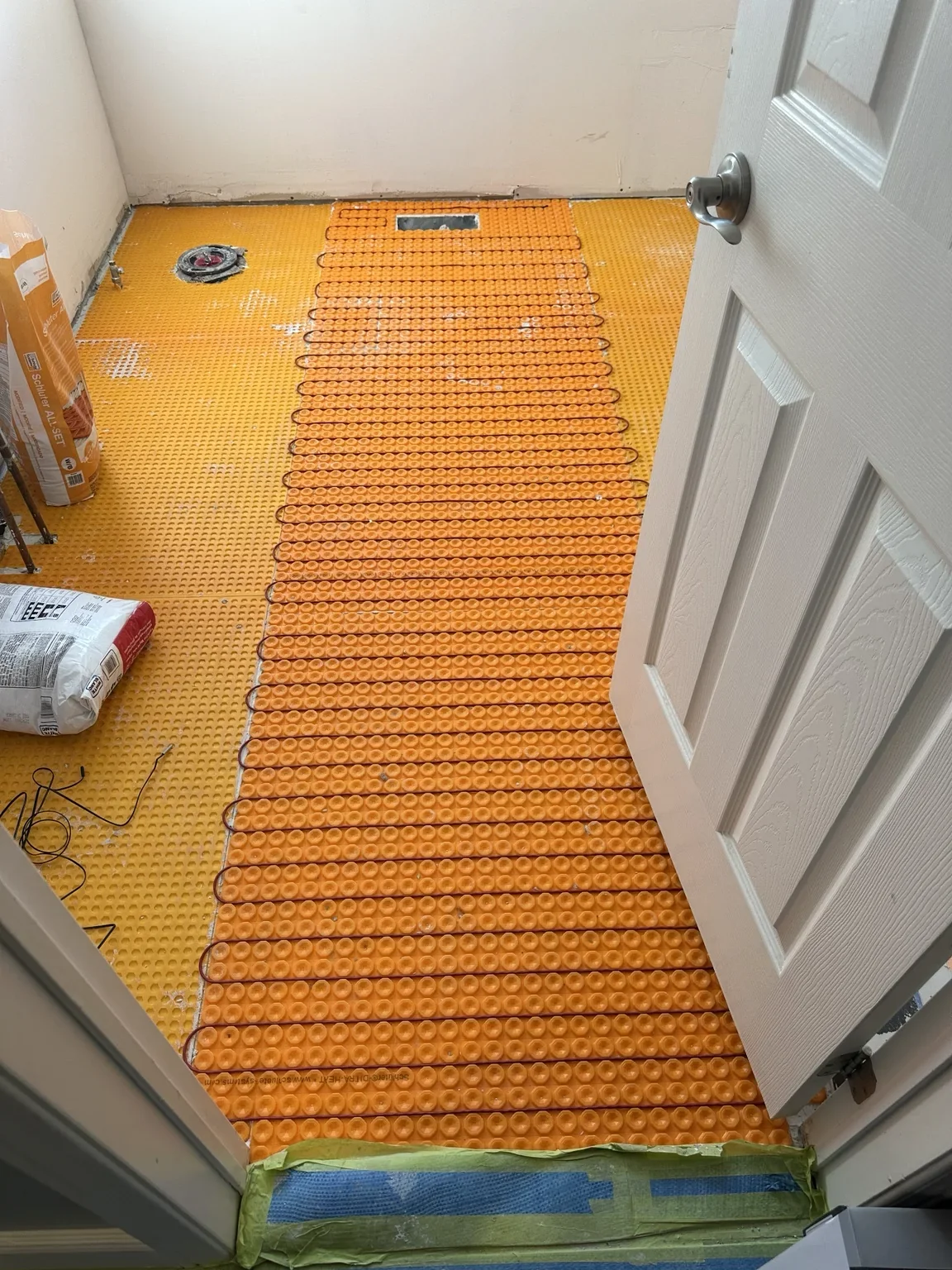 Electric heated bathroom floor installation in Oakville