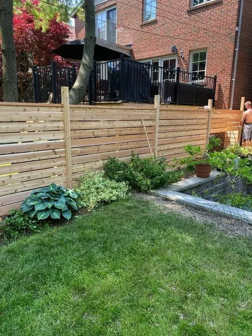 Custom cedar privacy fence installation detail