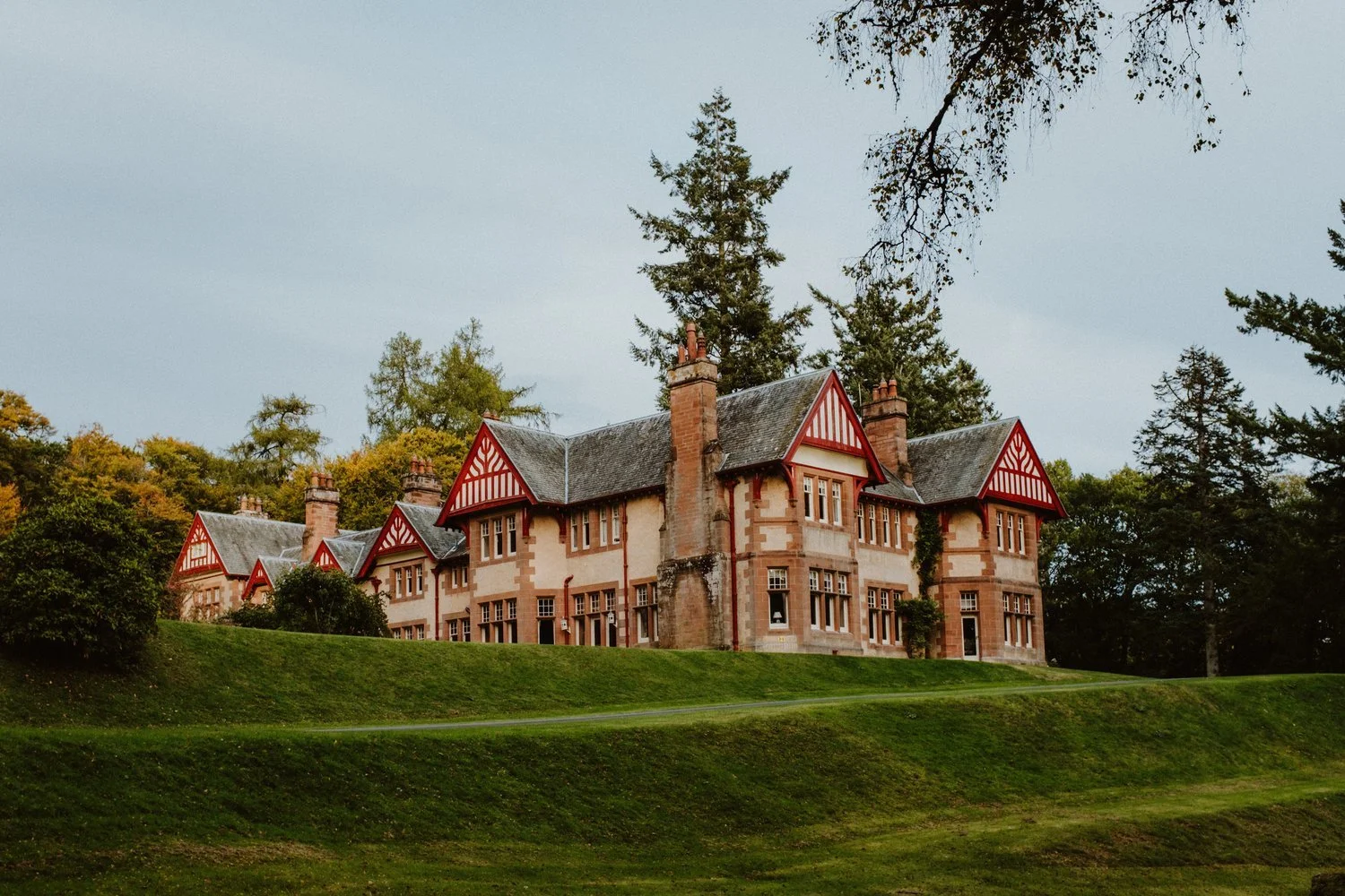 Dungarthill House across its lawns on a summer evening