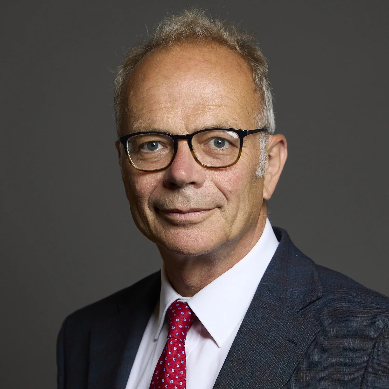 Dr Simon Opher MP MBE