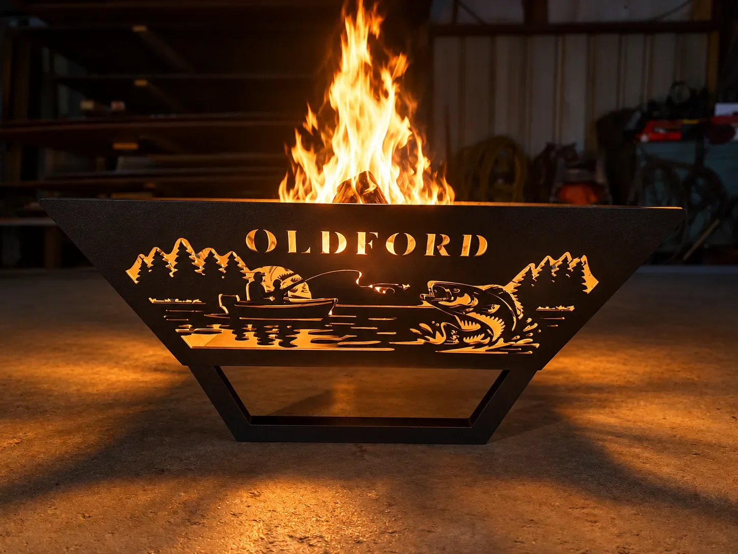 Dallaire custom-cut steel fire pit with fishing design