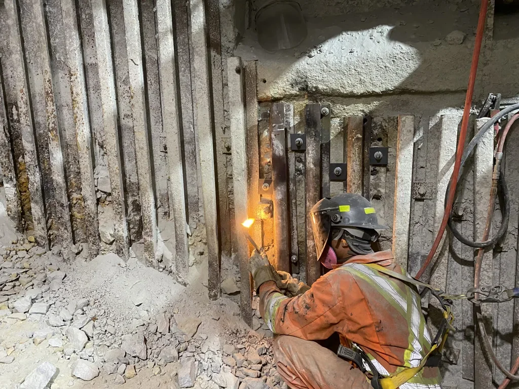 Dallaire crew working on headframe ore bin infrastructure