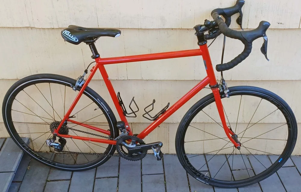 An orange Gunnar road bike