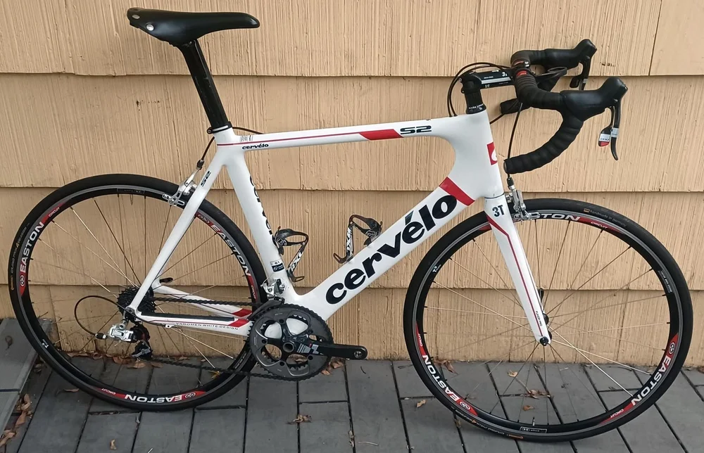 A white and red Cervelo S2 road bike
