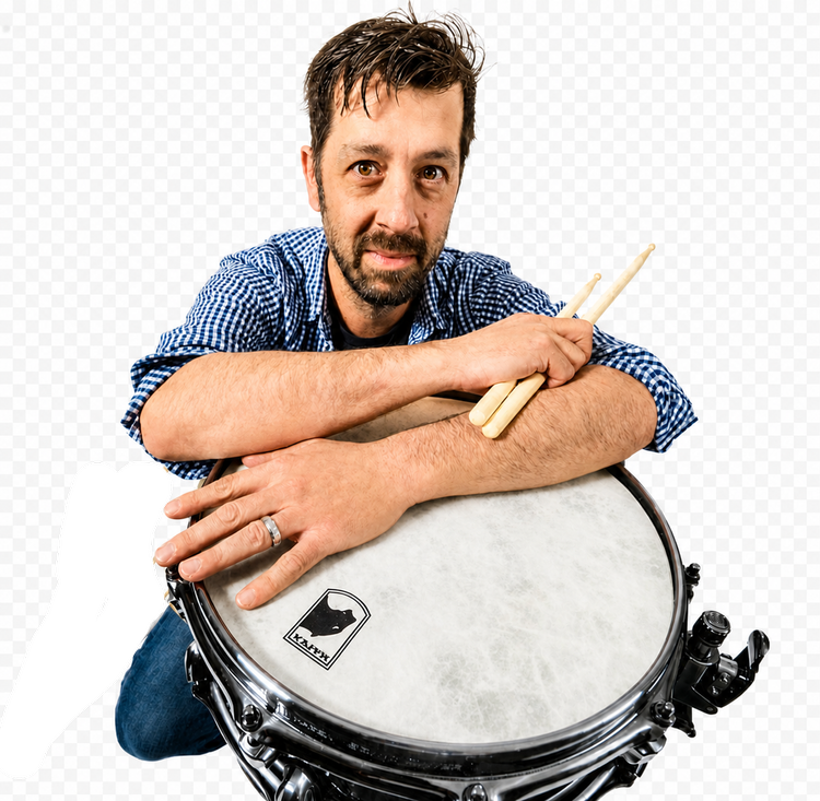 Meshem Jackson smiling behind a snare drum