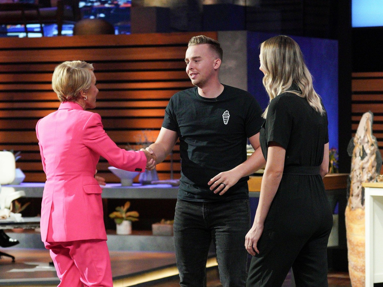 Crispy Cones founders shaking hands with Barbara Corcoran on Shark Tank
