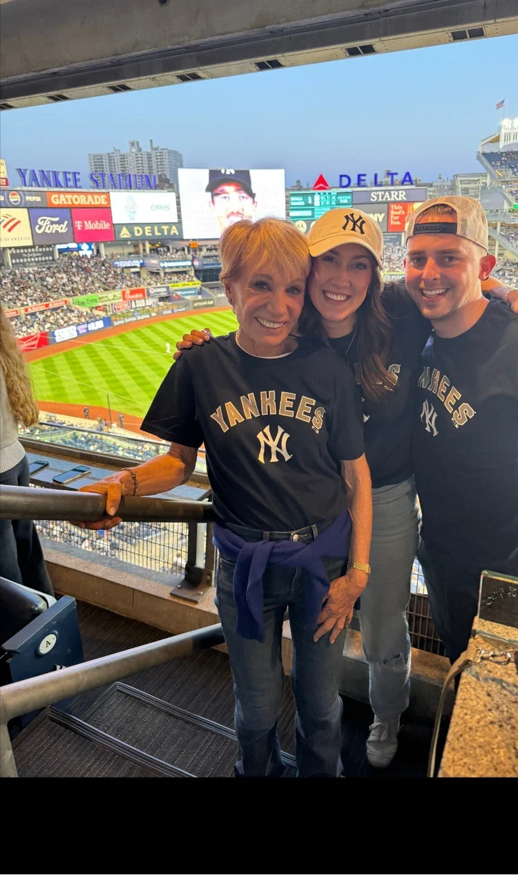 The founders with Barbara Corcoran at a Yankees game