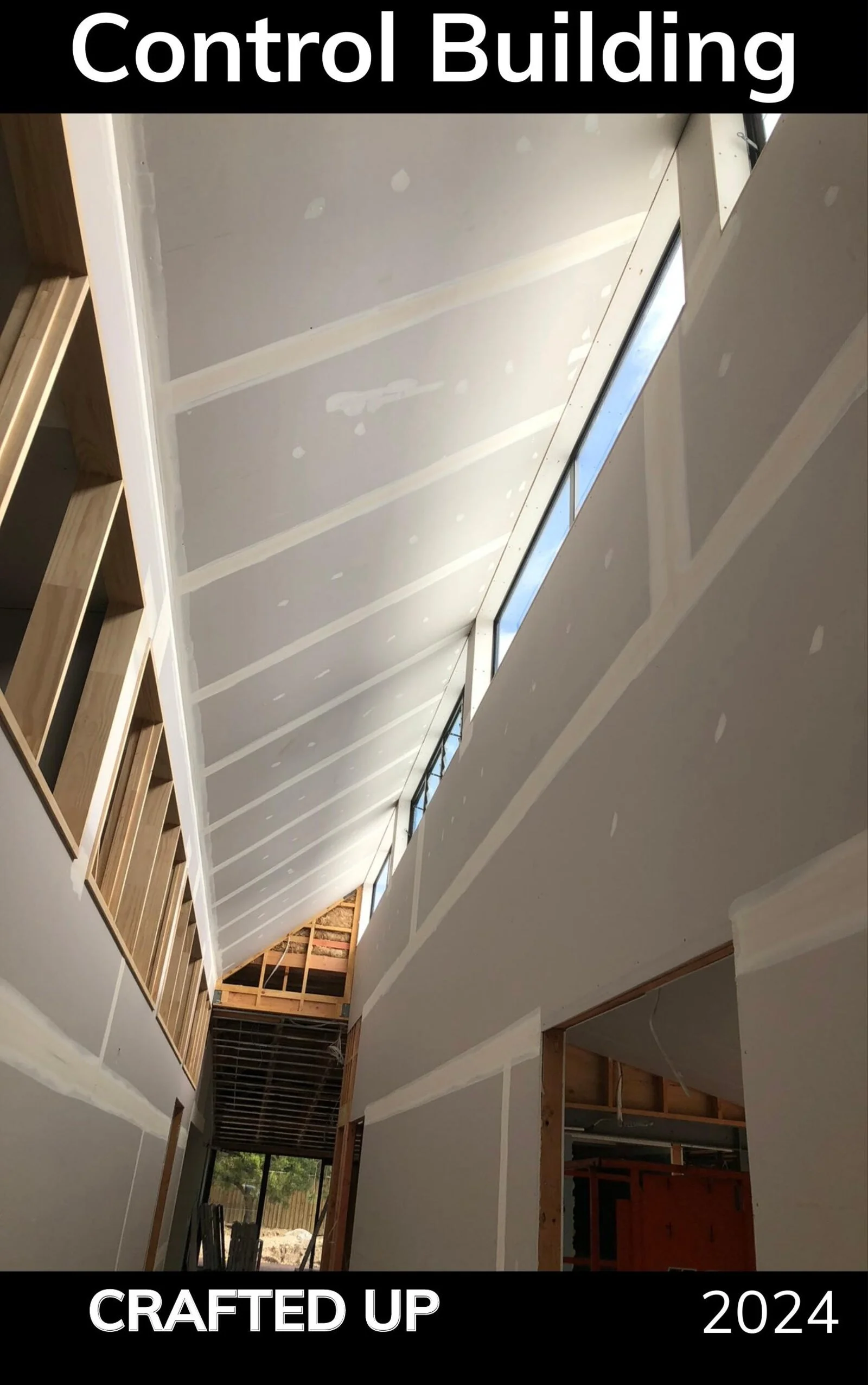 Plasterboard lined light well ceiling with clerestory windows in transport control building