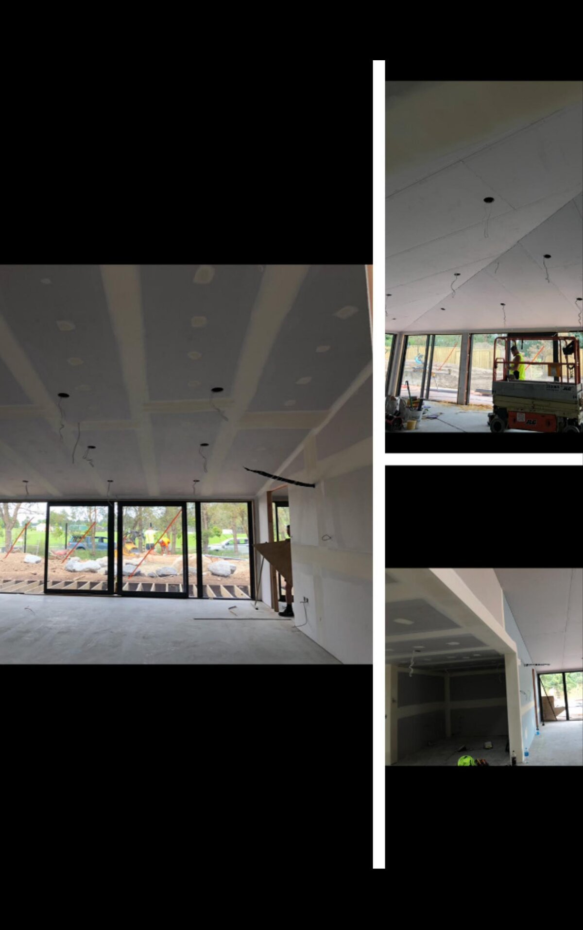 Completed plasterboard ceilings with downlights and lined walls